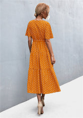 Robe imprimée à col en V et manches flottantes avec ceinture